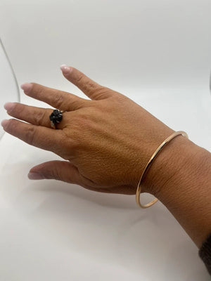 Bracelet jonc en acier inoxydable couleur or rose diamètre 6,5 cm excellent état