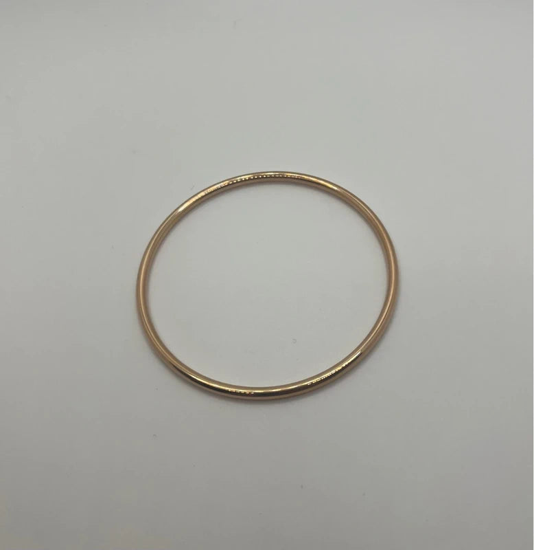Bracelet jonc en acier inoxydable couleur or rose diamètre 6,5 cm excellent état