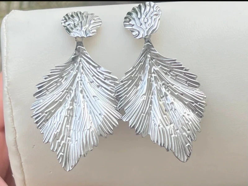 Boucles d oreilles en acier inoxydable ciselé long 7 cm excellent état