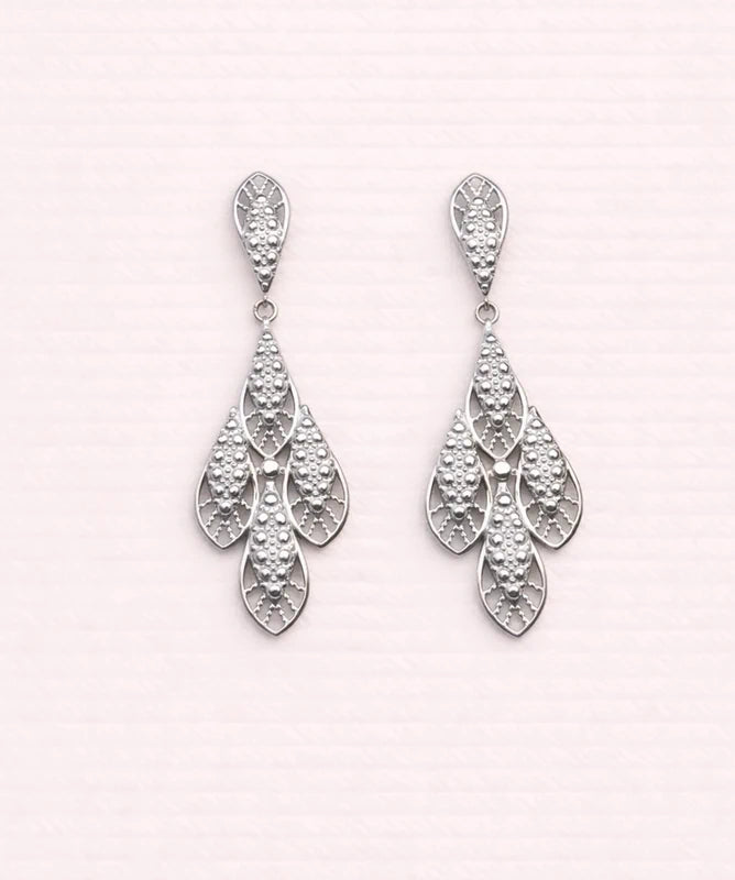 Boucles d oreilles en acier inoxydable ciselé long 7 cm très bon état