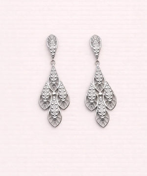 Boucles d oreilles en acier inoxydable ciselé long 7 cm très bon état